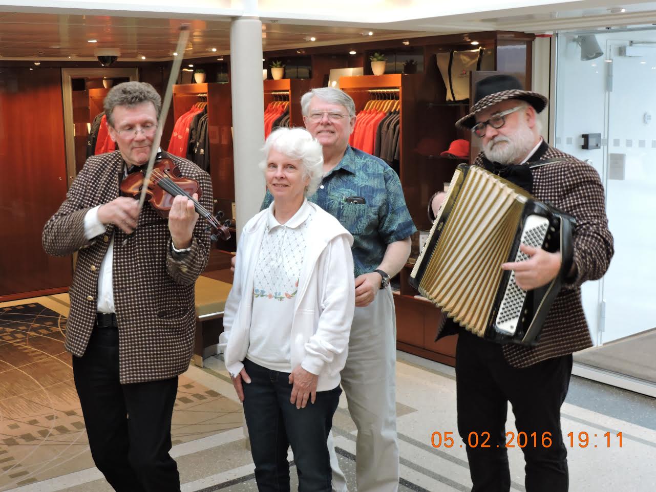 Mary. Enjoyed our Viking River Cruise immensely. Attached is a photo of us with one of the nightly entertainments that they had.  Greg and Mary Benes